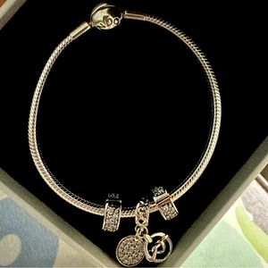 Brand new Pandora bracelet with 3 charms